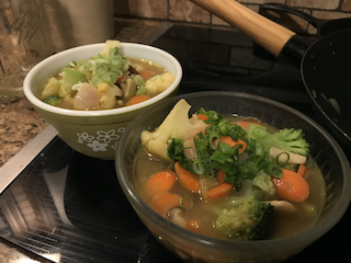 two bowls of veggie soba noodle soup